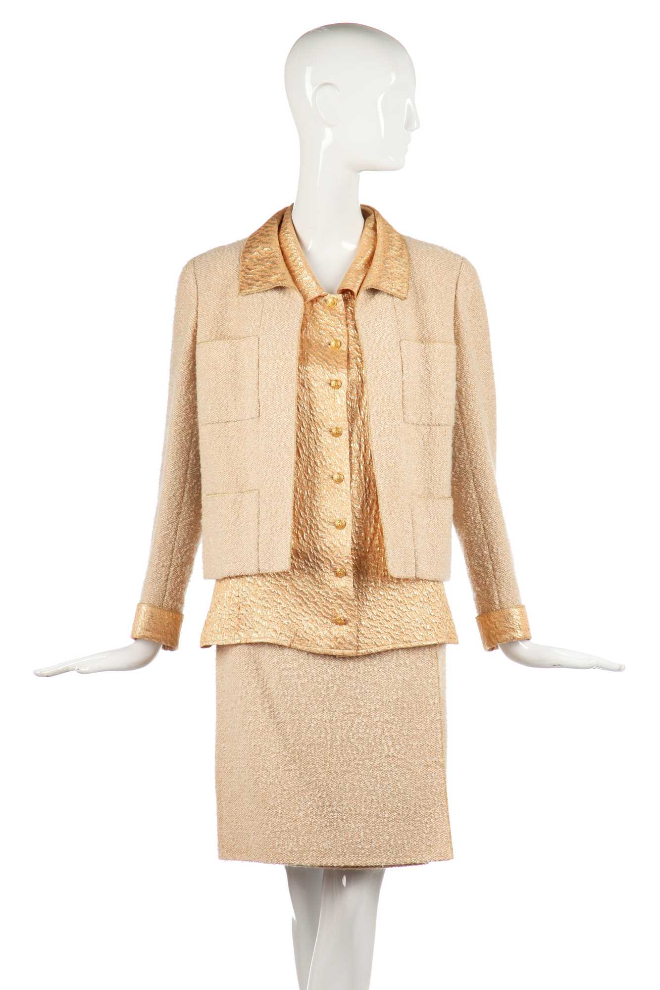 Lot 21 - A Chanel bouclé wool and apricot-gold lamé three-piece ensemble, Autumn-Winter 1996-97