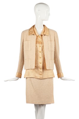 Lot 21 - A Chanel bouclé wool and apricot-gold lamé three-piece ensemble, Autumn-Winter 1996-97