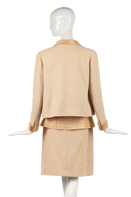 Lot 21 - A Chanel bouclé wool and apricot-gold lamé three-piece ensemble, Autumn-Winter 1996-97