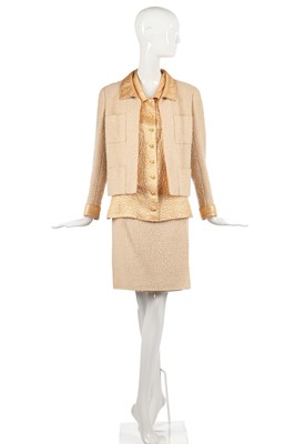 Lot 21 - A Chanel bouclé wool and apricot-gold lamé three-piece ensemble, Autumn-Winter 1996-97
