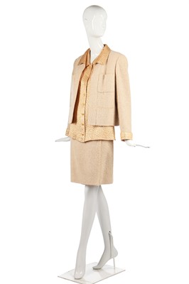 Lot 21 - A Chanel bouclé wool and apricot-gold lamé three-piece ensemble, Autumn-Winter 1996-97