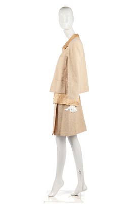 Lot 21 - A Chanel bouclé wool and apricot-gold lamé three-piece ensemble, Autumn-Winter 1996-97