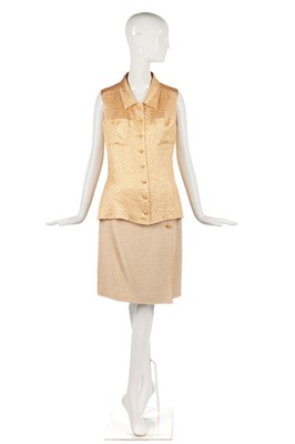 Lot 21 - A Chanel bouclé wool and apricot-gold lamé three-piece ensemble, Autumn-Winter 1996-97