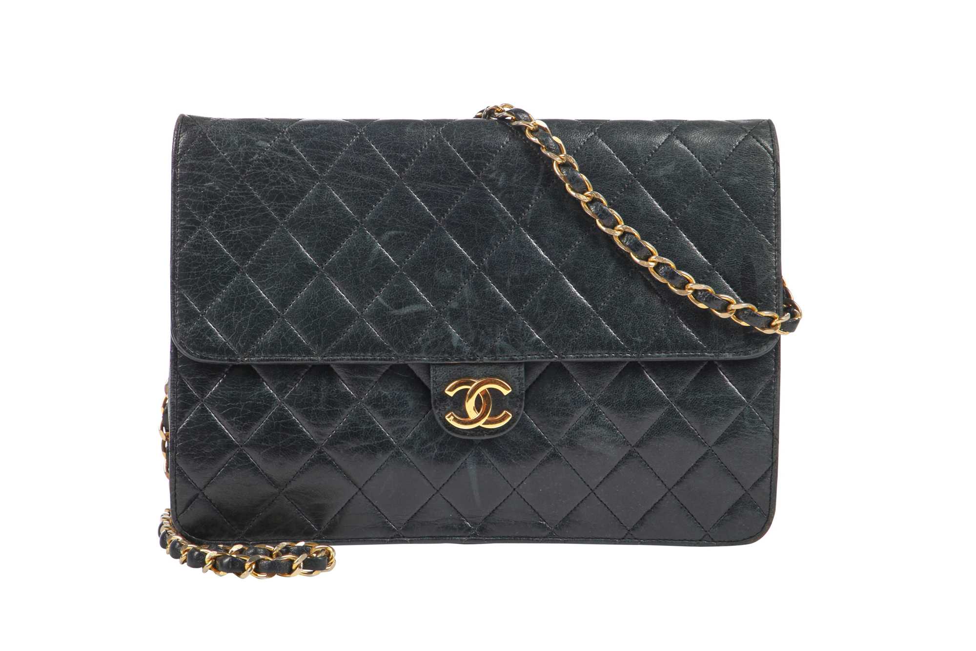 Lot 4 - A Chanel navy quilted lambskin leather flap bag, probably 1980s