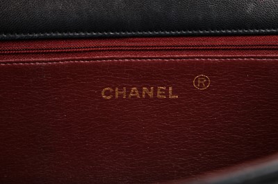 Lot 4 - A Chanel navy quilted lambskin leather flap bag, probably 1980s