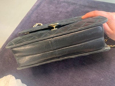 Lot 4 - A Chanel navy quilted lambskin leather flap bag, probably 1980s