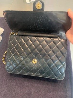 Lot 4 - A Chanel navy quilted lambskin leather flap bag, probably 1980s