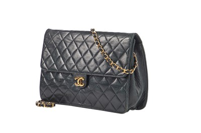 Lot 4 - A Chanel navy quilted lambskin leather flap bag, probably 1980s