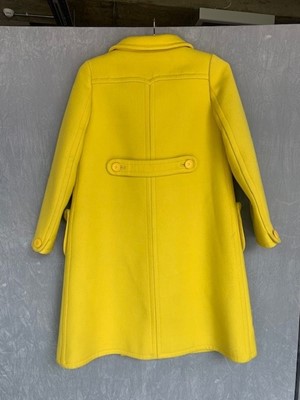 Lot 301 - A Courrèges lemon-yellow wool double-breasted coat, circa 1967