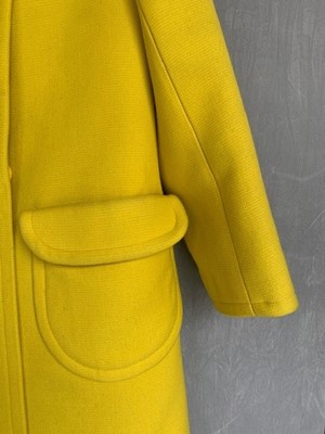 Lot 301 - A Courrèges lemon-yellow wool double-breasted coat, circa 1967