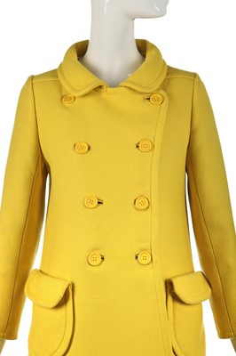 Lot 301 - A Courrèges lemon-yellow wool double-breasted coat, circa 1967