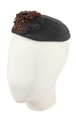 Lot 278 - A Balenciaga black silk faille toque, circa 1952