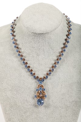 Lot 47 - A Dior necklace of faceted sky-blue and smoky glass cut-brilliants, 1961