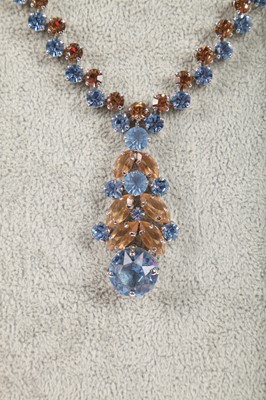 Lot 47 - A Dior necklace of faceted sky-blue and smoky glass cut-brilliants, 1961