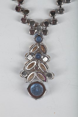 Lot 47 - A Dior necklace of faceted sky-blue and smoky glass cut-brilliants, 1961