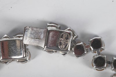 Lot 47 - A Dior necklace of faceted sky-blue and smoky glass cut-brilliants, 1961