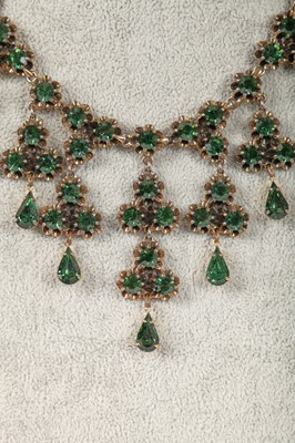 Lot 48 - A Schiaparelli parure of faceted green glass stones, late 1950s-early 1960s
