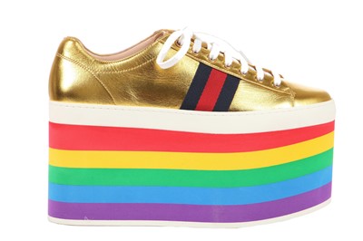 Lot 100 - A pair of Gucci gold leather trainers with rainbow foam platform soles, Resort 2017 collection