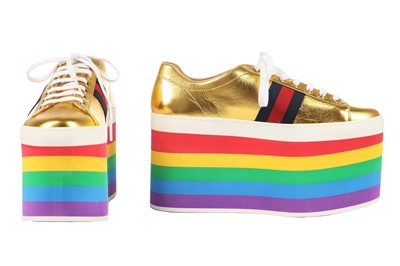 Lot 100 - A pair of Gucci gold leather trainers with rainbow foam platform soles, Resort 2017 collection
