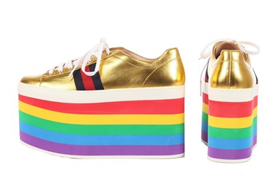 Lot 100 - A pair of Gucci gold leather trainers with rainbow foam platform soles, Resort 2017 collection