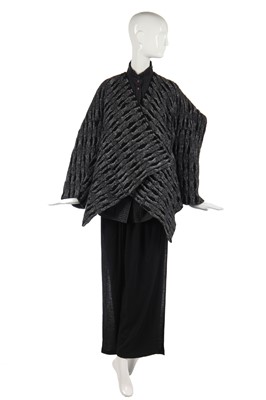 Lot 344 - An Issey Miyake textured wool jacket in shades of blue-grey and black, circa 1983