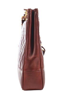 Lot 10 - A Chanel brown quilted lambskin leather bag, early 1990s