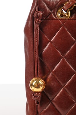 Lot 10 - A Chanel brown quilted lambskin leather bag, early 1990s
