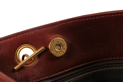 Lot 10 - A Chanel brown quilted lambskin leather bag, early 1990s