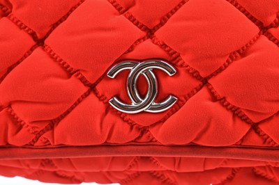 Lot 2 - A Chanel neon-orange jersey puffer-quilted flap bag, 2005-06