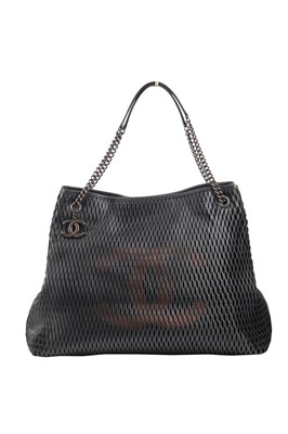 Lot 9 - A Chanel perforated leather bag, 2014-15