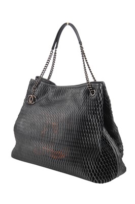 Lot 9 - A Chanel perforated leather bag, 2014-15