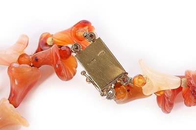 Lot 57 - A multi-strand agate necklace with 18kt gold...
