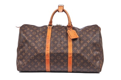 Lot 58 - Three Louis Vuitton monogrammed canvas leather holdalls