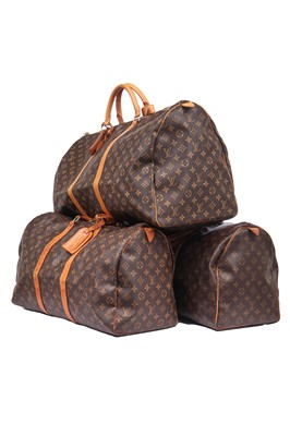 Lot 58 - Three Louis Vuitton monogrammed canvas leather holdalls