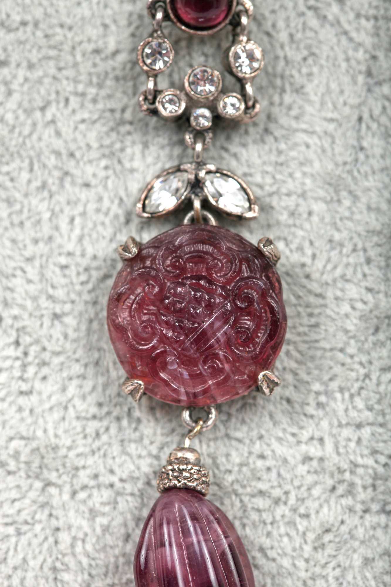 Lot 67 - A pair of Christian Dior/ John Galliano by Goossens carved amethyst earrings, probably Spring-Summer 1998