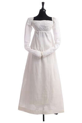 Lot 281 - A whitework embroidered empire-line dress, 1800-1810