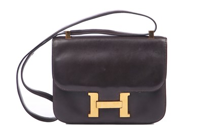 Lot 53 - An Hermès brown box leather Constance, 1974