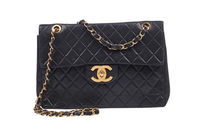 Lot 4 - A Chanel quilted navy lambskin leather jumbo flap bag, circa 1994-96