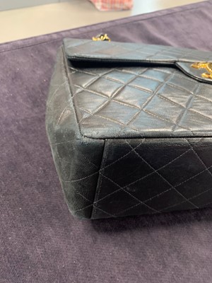 Lot 4 - A Chanel quilted navy lambskin leather jumbo flap bag, circa 1994-96