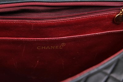 Lot 4 - A Chanel quilted navy lambskin leather jumbo flap bag, circa 1994-96