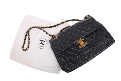 Lot 4 - A Chanel quilted navy lambskin leather jumbo flap bag, circa 1994-96