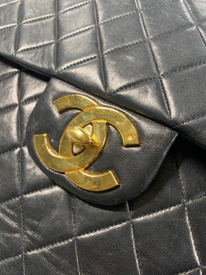 Lot 4 - A Chanel quilted navy lambskin leather jumbo flap bag, circa 1994-96