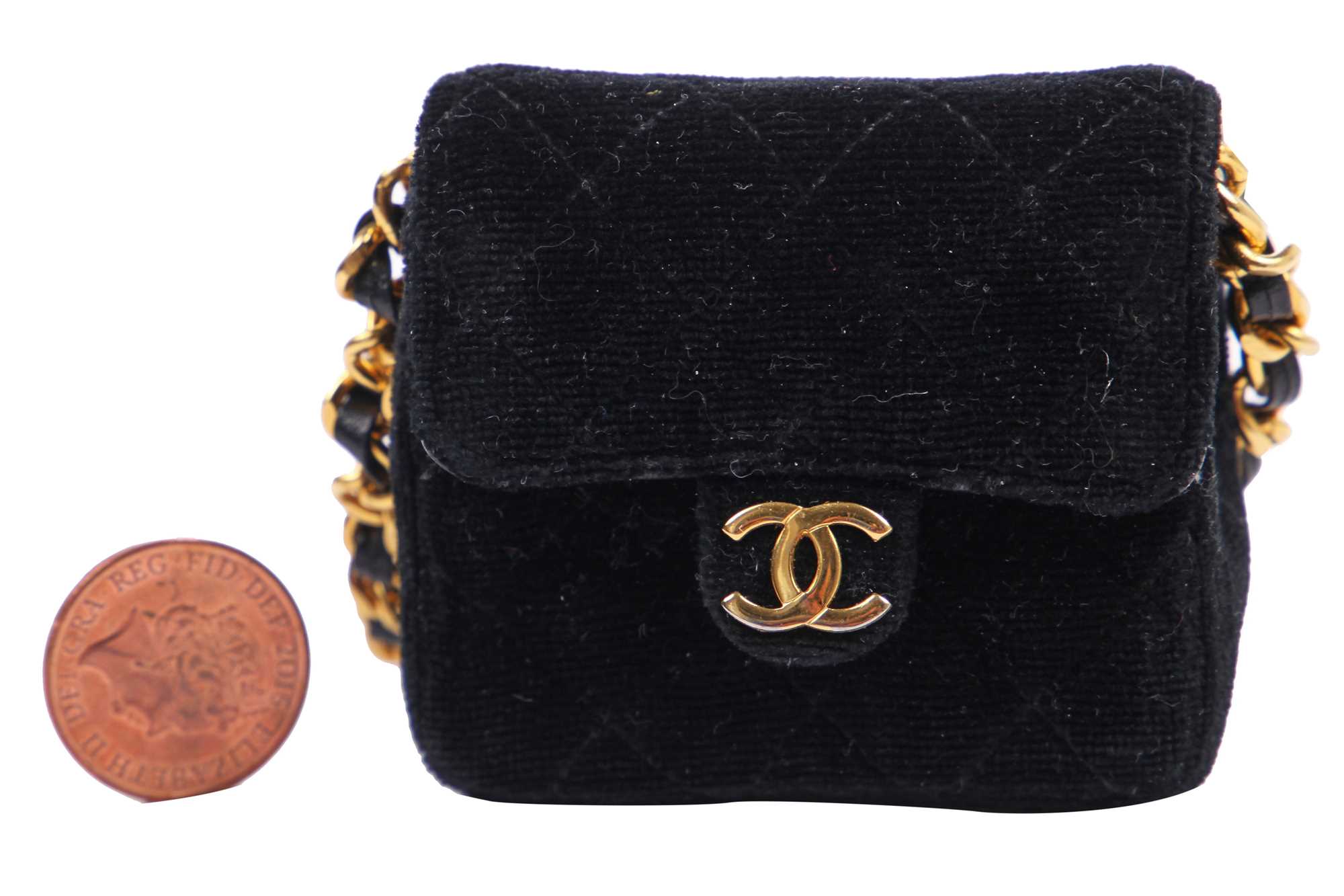 Lot 1 - A Chanel micro mini quilted velvet bag, 1980s-90s