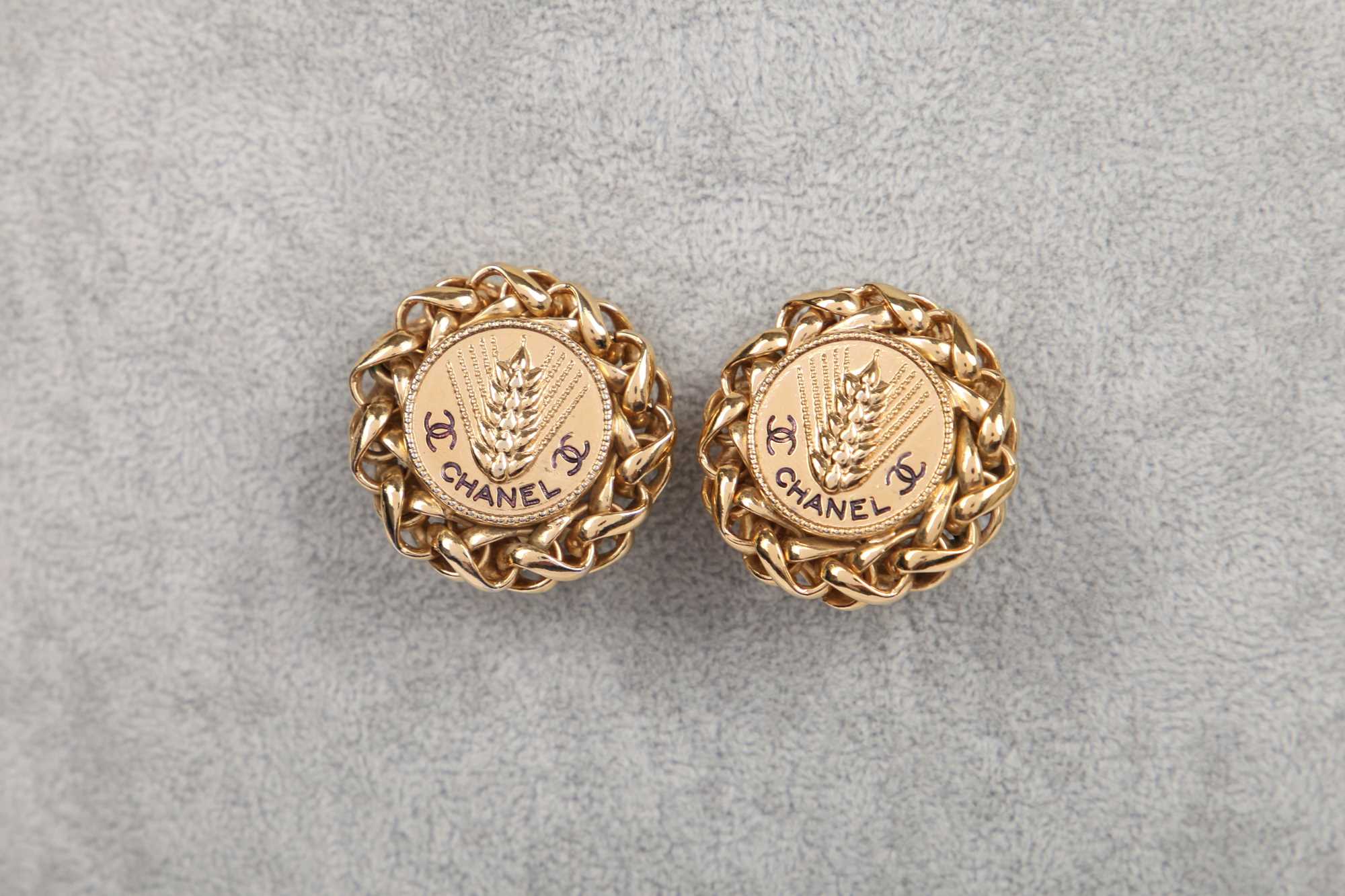 Lot 25 - A pair of Chanel gilt metal clip-on earrings, Autumn-Winter 1986-87 couture collection