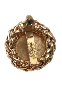 Lot 25 - A pair of Chanel gilt metal clip-on earrings, Autumn-Winter 1986-87 couture collection