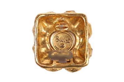 Lot 23 - A pair of Chanel gilt metal earrings with cut brilliants, circa 1990