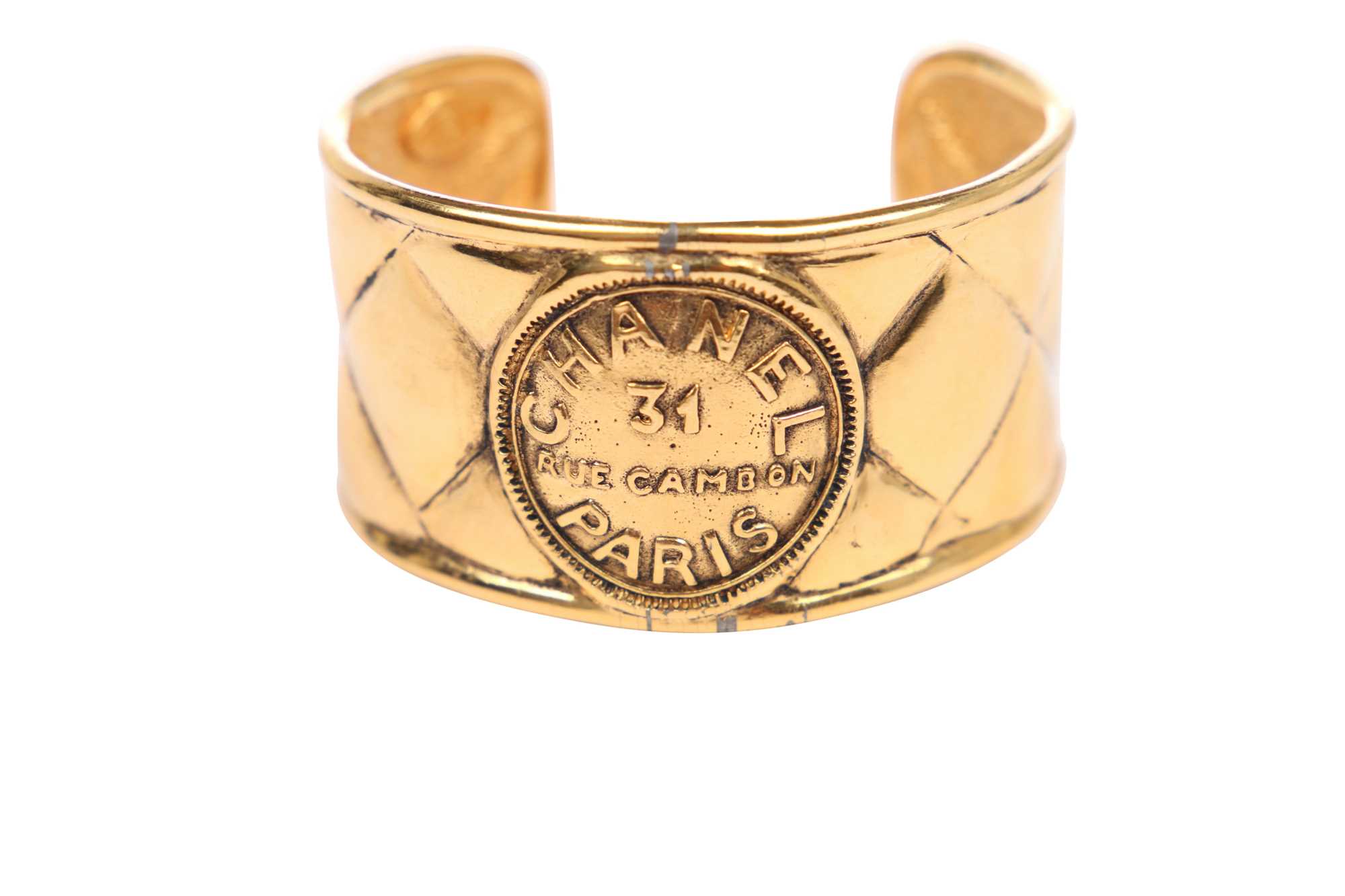 Lot 27 - A Chanel 'quilted' gilt metal cuff, circa 1990