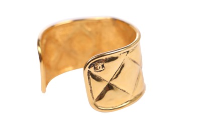 Lot 27 - A Chanel 'quilted' gilt metal cuff, circa 1990