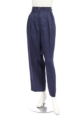 Lot 47 - A pair of Hermès dark blue linen trousers, 1990s