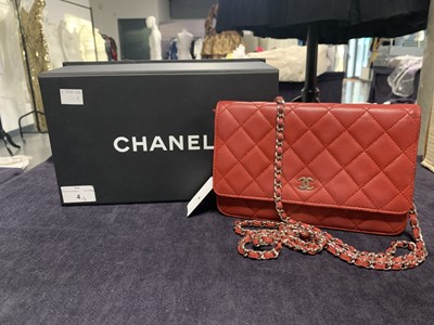 Lot 4 - A Chanel quilted red lambskin leather WOC, 2014